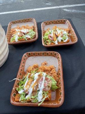 Enchiladas Plate with rice and beans.