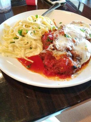 Chicken parmigiana with fettuccine Alfredo.  Cooked to perfection!