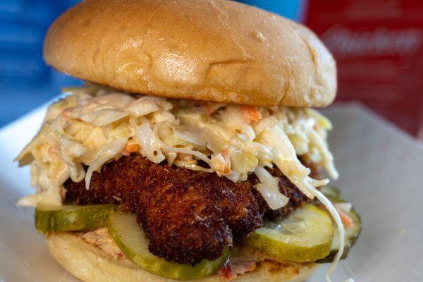 Crispy chicken with pimento, pickles, slaw.