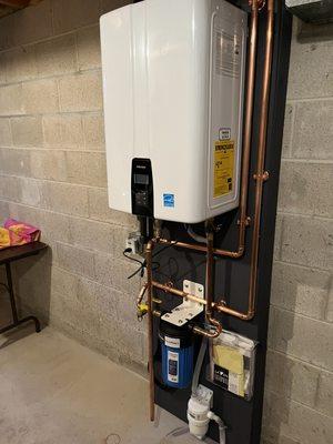 Navien tankless water heater install. Call today for a free estimate.