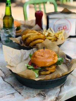 CG Burgers - $5 single burgers with cheddar, lettuce, tomato, grilled onions + their stellar onion rings and fries. Good stuff!