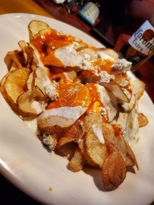 Chips with Buffalo sauce and blue cheese