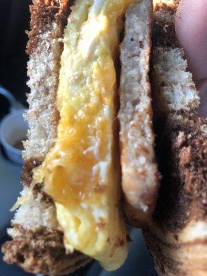 Breakfast sandwich - Eggs sausage on Rye bread