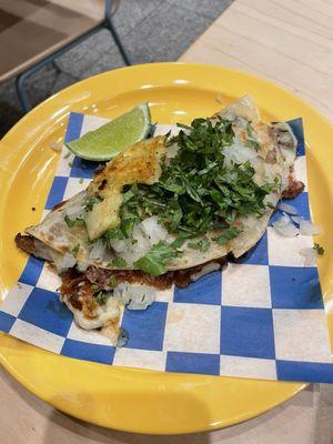 Gringa (flour tortilla, chihuahua cheese, cilantro, onions, pastor and pineapple)