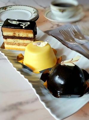 Opera Cake (Coffee Buttercream & Chocolate Ganache filling), Lemon Cake w/Lemon Custard filling & Chocolate Mousse Cake.