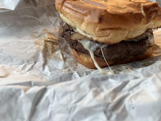 Excellent nice buck cheeseburger with mushrooms  Roll toasted nice