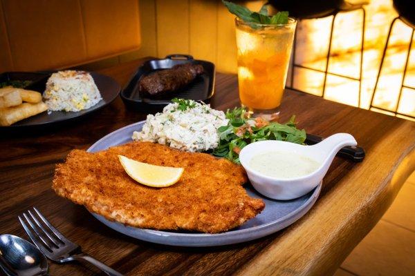 Satisfy your cravings with our mouth-watering Pork Schnitzel!