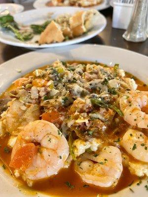 Shrimp and Grits with crispy bacon, onions and peppers