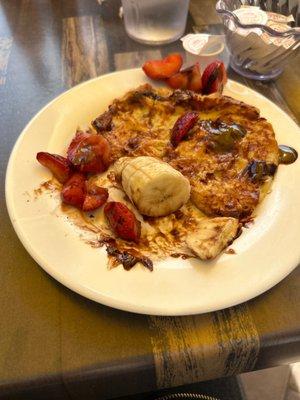 Croissant with bananas and chocolate sauce not very edible