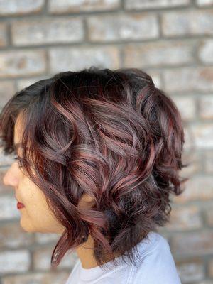 Red highlights on dark hair