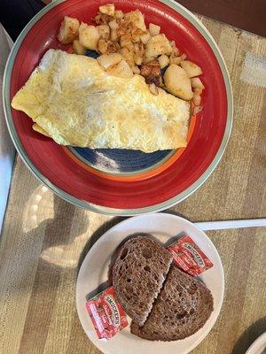 Veggie omelet with home fries and toast