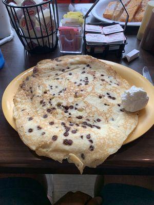 Child chocolate chip pancake, platter size.