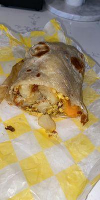 Huge, breakfast burrito! Bacon, egg, cheese and potato. So good.