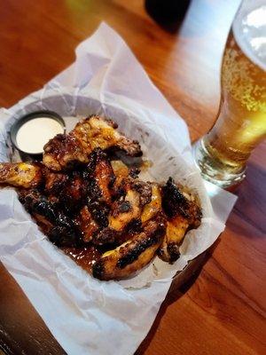 Grilled Sweet Thai Chili chicken wings with bleu cheese dip and 24 oz. Bud Light draft pilsner