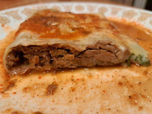 Inside the Birria Giant Quesadilla with Consome on top