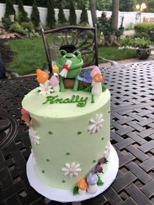 Whimsical frog graduation cake!