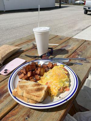 Veggie omelette and home fries