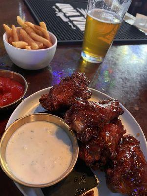 Spicy honey wings and side of fries