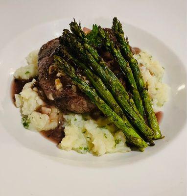 Filet Gorgonzola atop garlic mashed potatoes with demigloss and asparagus