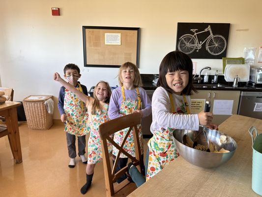 Lower Elementary students baking weekly banana bread.