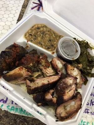 Jerked chicken, rib tips, pinto beans and turnip and mustard greens. Delicious!