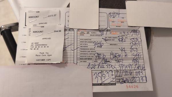 Incomprehensible chicken scratch with $353.37 circled at the bottom. Glad I pushed back, still paid $318.