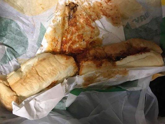 the hubby and i both went to this subway to grab a couple quick sandwiches. i ordered a foot long meatball sub , the guy pulled the bread ou