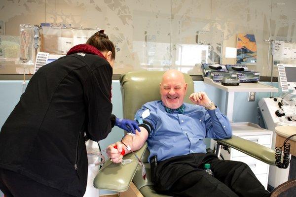 Donor giving blood.