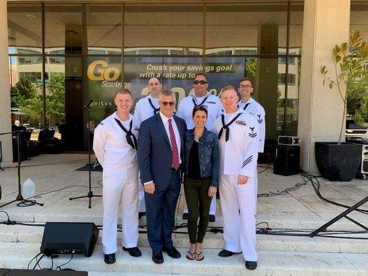 What an honor to host a free concert by the Navy Rock Band on Unitus Plaza, pictured here with our CEO Steve Stapp and his wife Michelle.