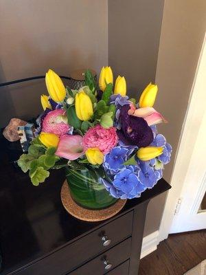 About $100 and this arrangement is gorgeous.  Hydrangea, lily, orchid, peony, tulip, Mexican mint, hyacinth.