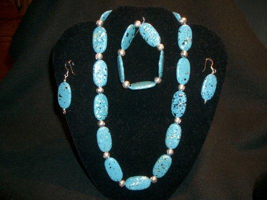 Turquoise/Black Speckle Oval Beads with Silver Accents