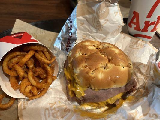 Cheddar double Arby meal with curly fries= $12.00