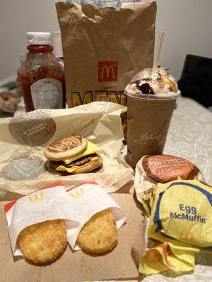 Sausage McGriddle, Egg McMuffin, Hash Browns, Mocha Frappe with Caramel drizzle.