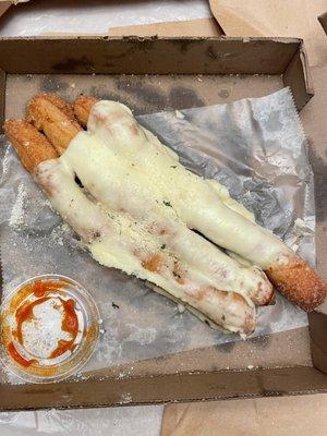 Literal breadsticks with a slice of cheese on top