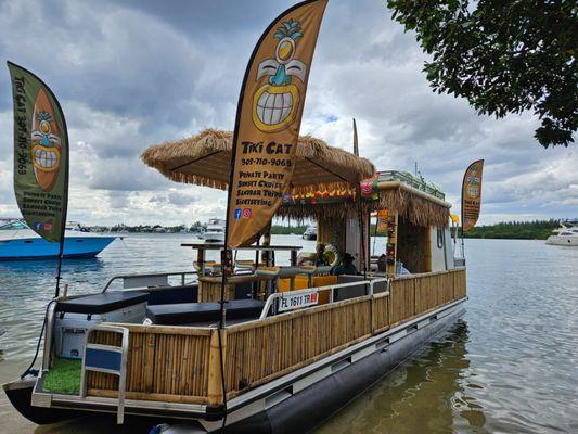 The Tiki Cat boat on the beach