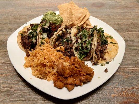 Tacos (left to right) - Al Pastor (2), Birria (1), Carnitas (2).