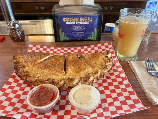 Calzone with pepperoni, black olives and mushrooms! Washed it down with Dirt Church IPA by Bitteroot Brewing.