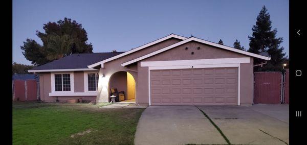 My home after roof replacement and the whole house painted.