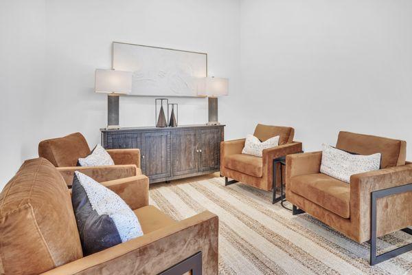 Cozy and fucntional sitting area in Clubhouse at apartment community in Clearfield.