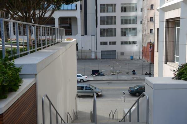 View descending stairs of Sun Terrace back down to Mission Street