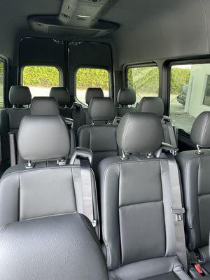 UCS Limo's new Sprinter 170' wheelbase 15 passenger van black leatherette seating