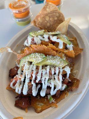 Tacos - one with birria and one with bacon