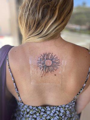 Sun tattoo by Siobhan