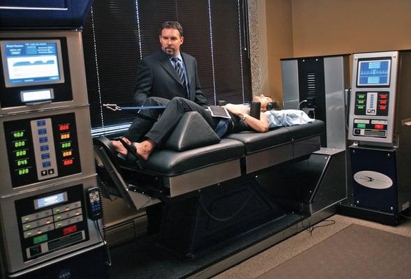 DRX9000 spinal decompression treatment. A non-surgical treatment for sciatica, bulging, and herniated discs in the neck and back