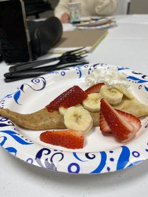 Strawberry jam with fresh berries and bananas