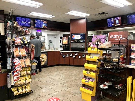 Interior. They make donuts, sub sandwiches and pizza!