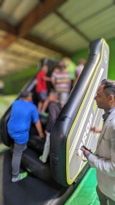 Bunch of kids jumping off at same time, "BIG" kids trying to make the little kids fall at the top of stairs. Staff don't care.