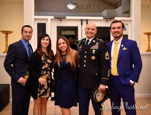 Alex Munoz, US Army Veteran and VA Mortgage Expert, with VA Loan Clients and old combat buddies.