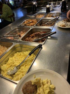 Main buffet eggs, meat, taters, grits, pancakes