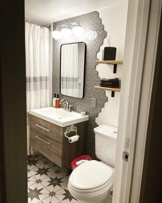 Bathroom Remodel. Roger did the floor and backsplash. Absolutely gorgeous!